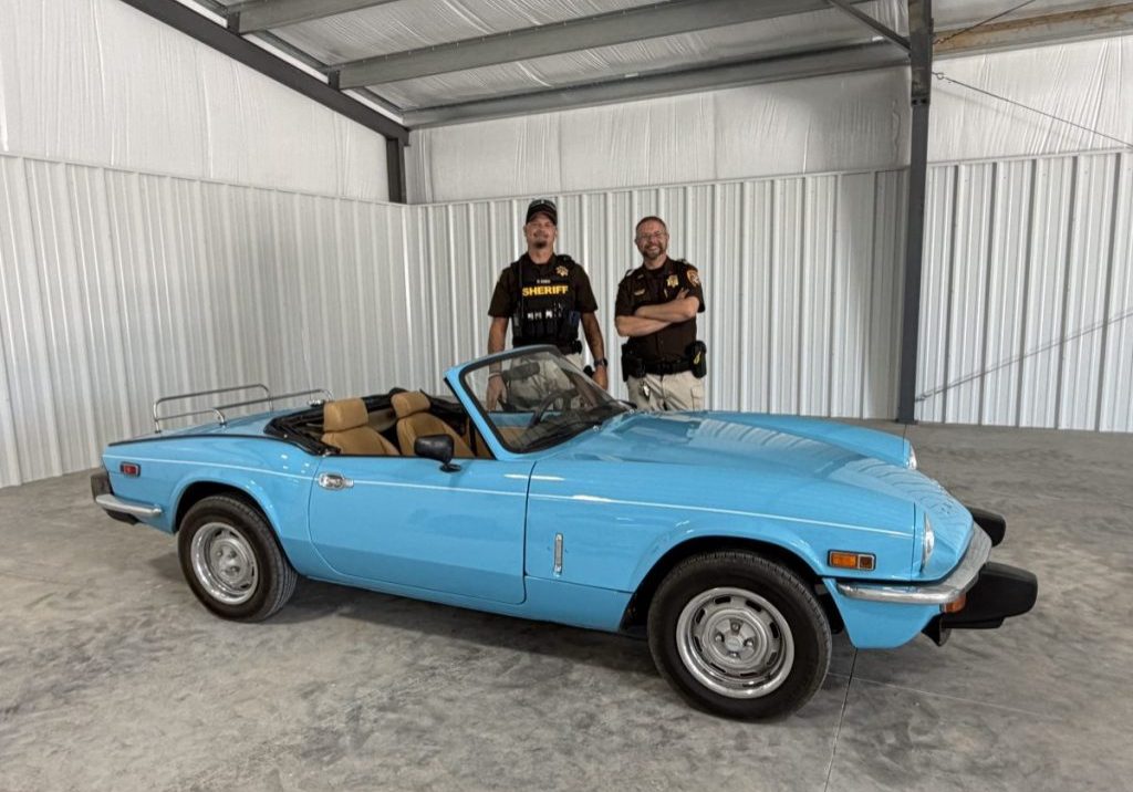 King and Damon with the 1976 Triumph Convertible